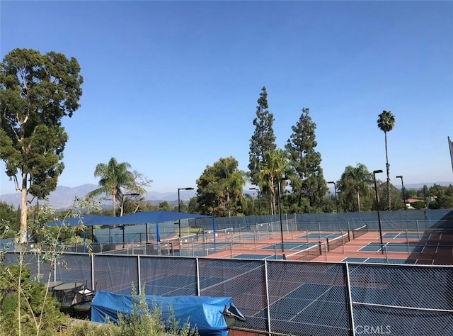 40N Calle Aragon, Laguna Woods, CA 92637 - view of sport court featuring fence