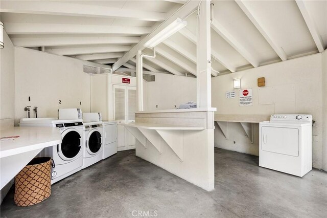 40N Calle Aragon, Laguna Woods, CA 92637 - common laundry area featuring washer and clothes dryer