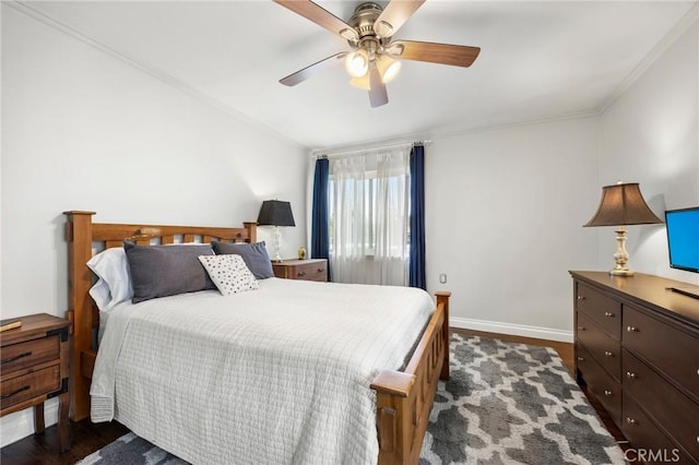 40N Calle Aragon, Laguna Woods, CA 92637 - bedroom with crown molding, baseboards, a ceiling fan, and wood finished floors