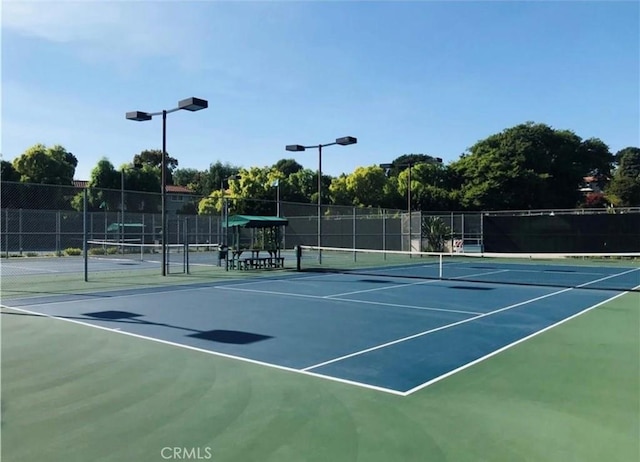 40N Calle Aragon, Laguna Woods, CA 92637 - view of sport court featuring fence and community basketball court