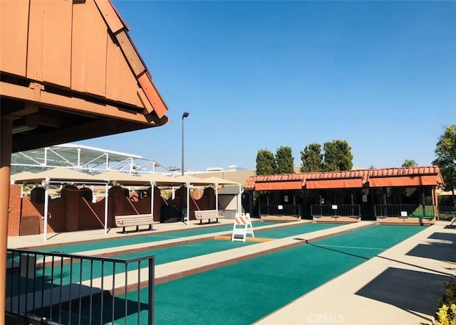 40N Calle Aragon, Laguna Woods, CA 92637 - view of pool with fence