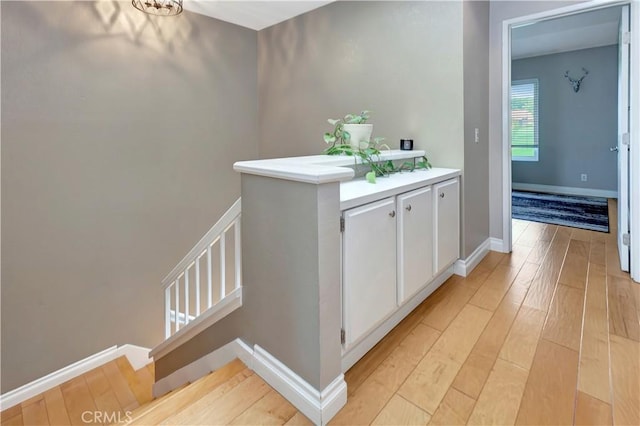 3 Holly Hill Ln, Laguna Hills, CA 92653 - hall with light wood-style flooring and baseboards