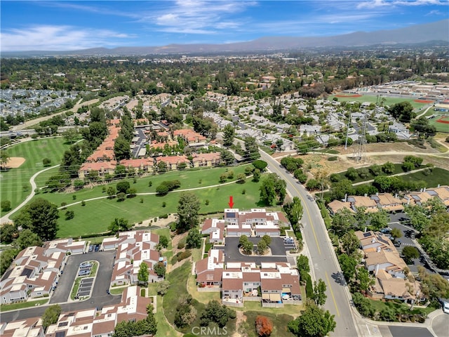3 Holly Hill Ln, Laguna Hills, CA 92653 - aerial view of property and surrounding area featuring nearby suburban area and a mountain backdrop