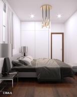 bedroom featuring dark wood-type flooring