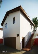 view of property exterior featuring a garage and stucco siding