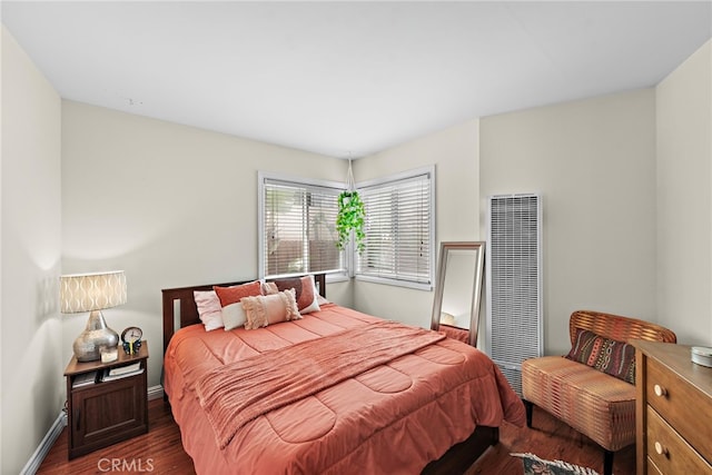 202 Avenida Monterey, San Clemente, CA 92672 - bedroom with a heating unit, dark wood-type flooring, and baseboards