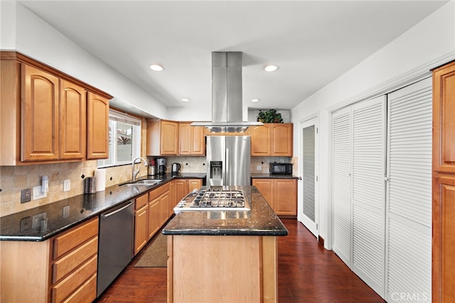 202 Avenida Monterey, San Clemente, CA 92672 - kitchen with appliances with stainless steel finishes, a sink, island range hood, a center island, and dark stone countertops