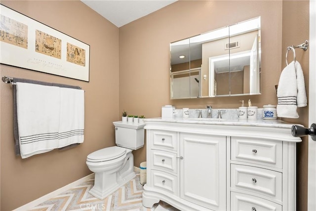 401 E Yale Loop Unit 20, Irvine, CA 92614 - bathroom with toilet, baseboards, and vanity