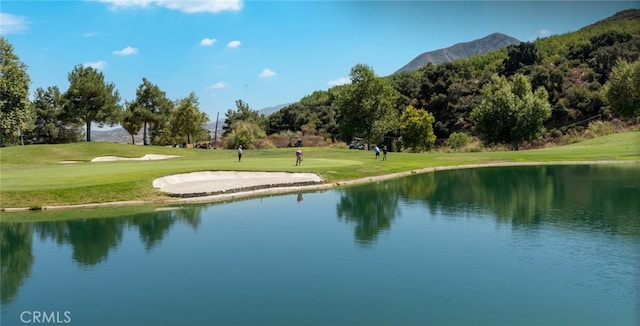 9169 Wooded Hill Dr, Corona, CA 92883 - exterior space featuring a yard, view of golf course, and a water and mountain view
