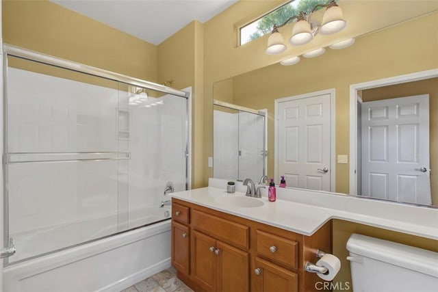 9169 Wooded Hill Dr, Corona, CA 92883 - bathroom with vanity, toilet, and shower / bath combination with glass door