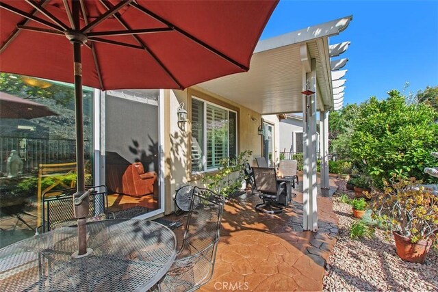 9169 Wooded Hill Dr, Corona, CA 92883 - view of patio / terrace with outdoor dining space
