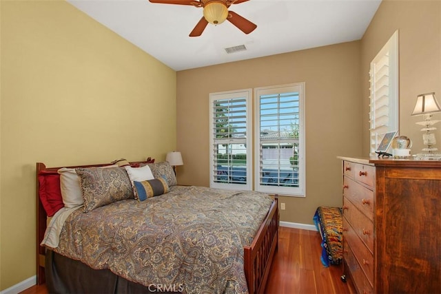 9169 Wooded Hill Dr, Corona, CA 92883 - bedroom with visible vents, baseboards, ceiling fan, and wood finished floors