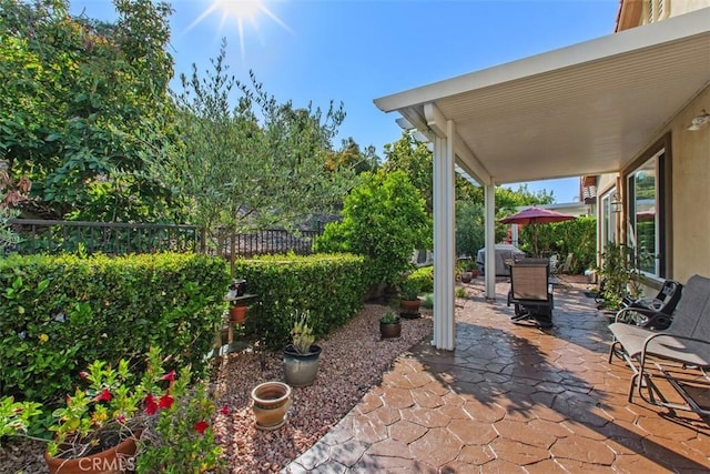 9169 Wooded Hill Dr, Corona, CA 92883 - view of patio / terrace with outdoor dining area and fence