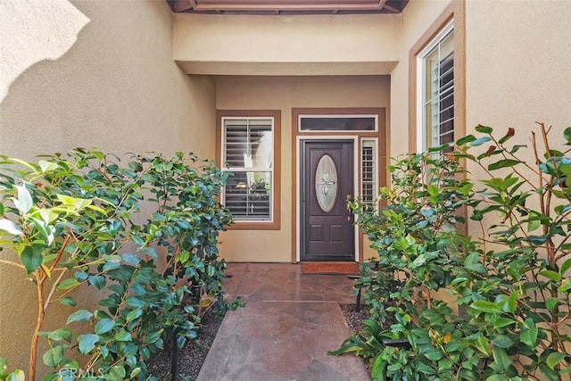 9169 Wooded Hill Dr, Corona, CA 92883 - doorway to property with stucco siding