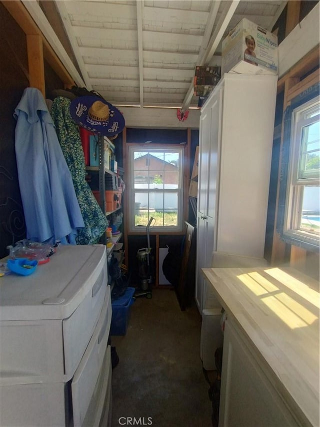 washroom featuring laundry area and wood ceiling