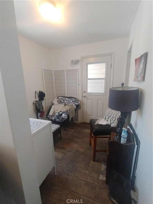 bedroom featuring dark wood-type flooring