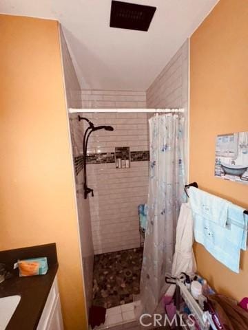 3620 Hoover St, Riverside, CA 92504 - bathroom with vanity and a tile shower