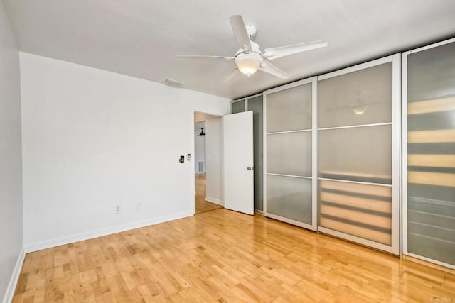 4549 Quailridge Dr, Oceanside, CA 92056 - unfurnished bedroom with wood finished floors and ceiling fan