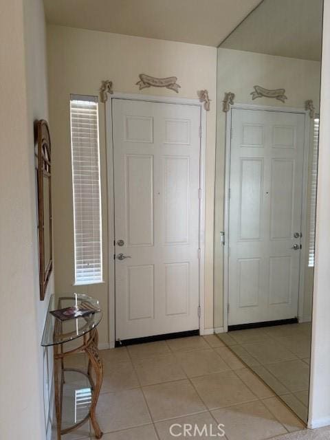 322 Brooklawn Dr, Banning, CA 92220 - foyer entrance with light tile patterned flooring