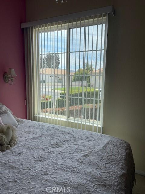 322 Brooklawn Dr, Banning, CA 92220 - bedroom featuring access to exterior