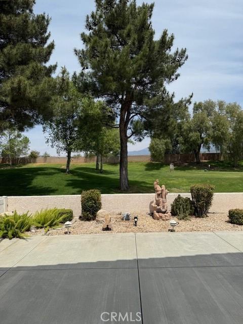 322 Brooklawn Dr, Banning, CA 92220 - view of community with a lawn