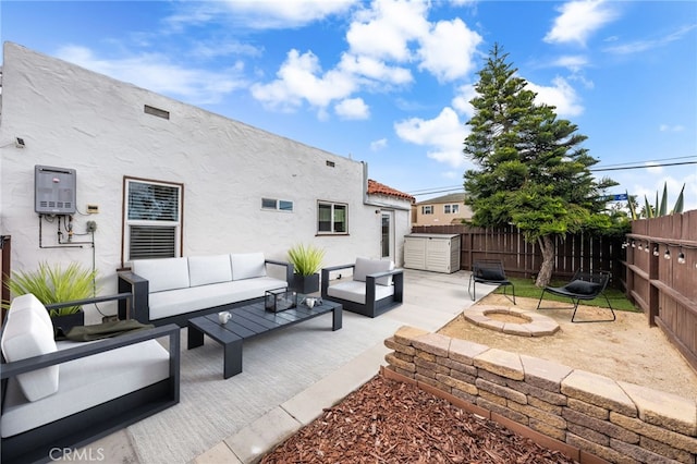 3204 Madison Ave, San Diego, CA 92116 - view of patio / terrace featuring fence and an outdoor living space with a fire pit