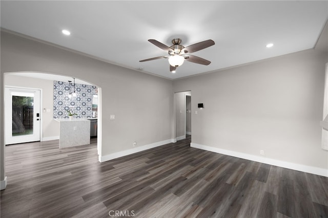 3204 Madison Ave, San Diego, CA 92116 - spare room with baseboards, arched walkways, dark wood-style flooring, and a ceiling fan