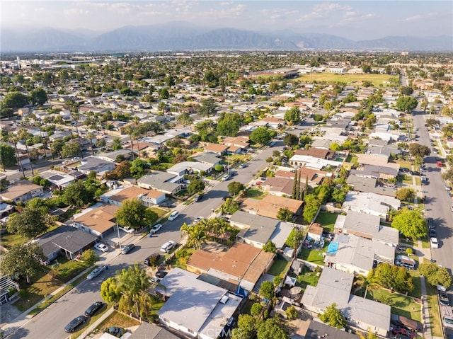 bird's eye view featuring a residential view and a mountain view