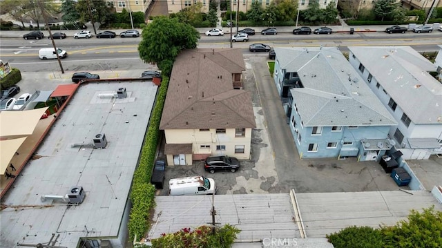 birds eye view of property with a residential view