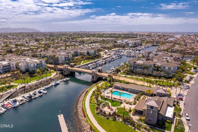 bird's eye view with a water and mountain view