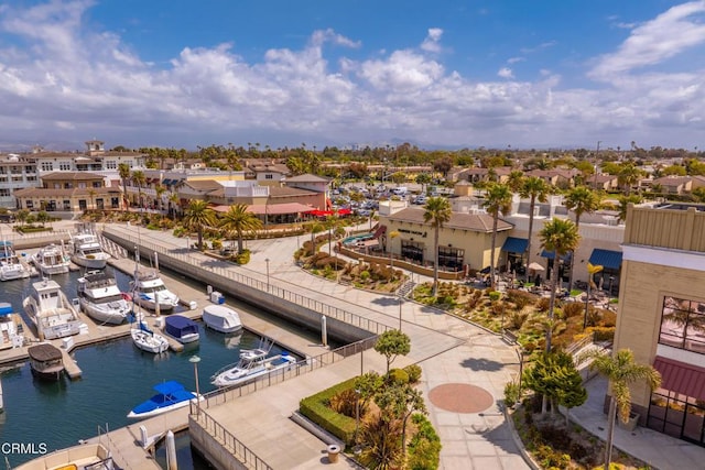 aerial view with a residential view and a water view