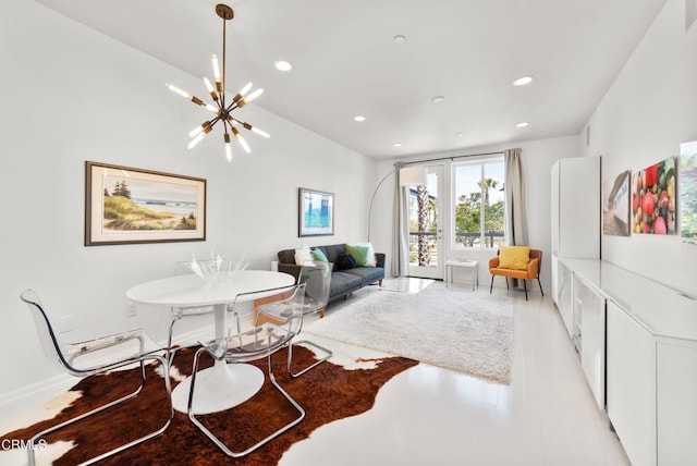 living area featuring recessed lighting and a notable chandelier