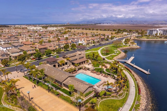 aerial view with a water view and a residential view