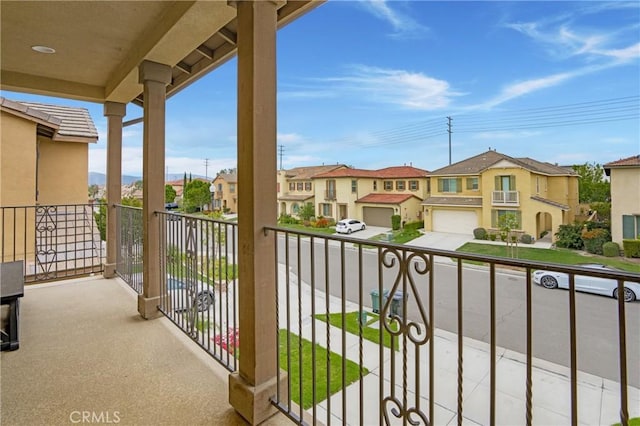 balcony featuring a residential view