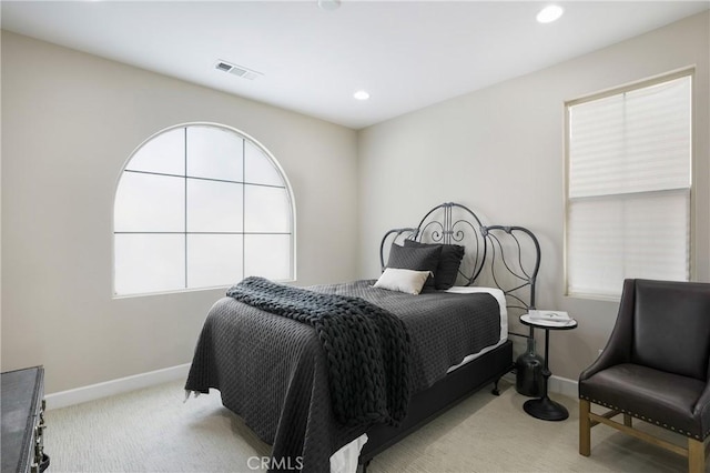 bedroom with recessed lighting, baseboards, visible vents, and carpet