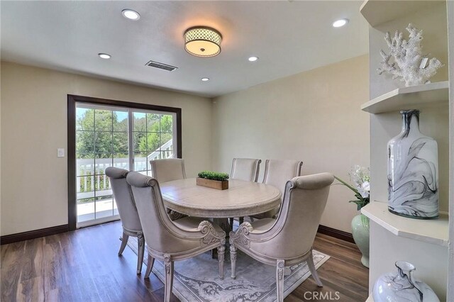 dining area with visible vents, recessed lighting, baseboards, and wood finished floors