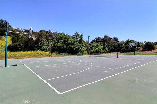 view of sport court with community basketball court