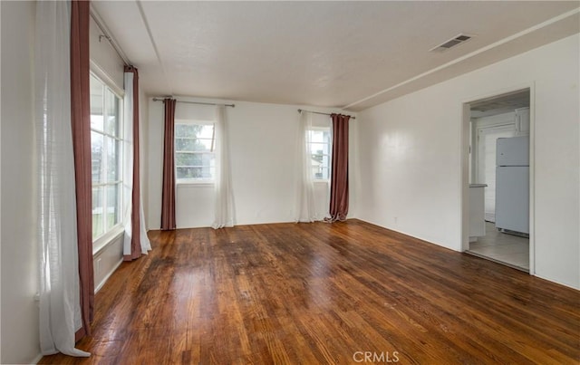 10609 Mountain View Ave, Redlands, CA 92373 - unfurnished room featuring visible vents and wood finished floors