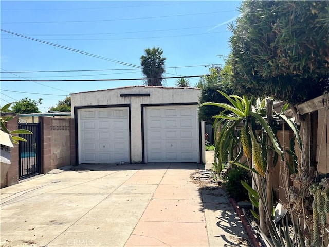 detached garage with fence