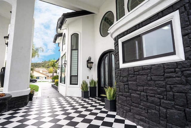 733 Clayburn Ct, Alpine, CA 91901 - view of side of home with stucco siding and stone siding