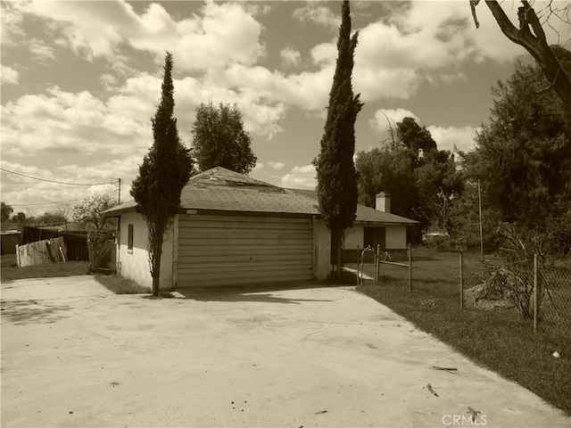 view of front of home featuring a chimney