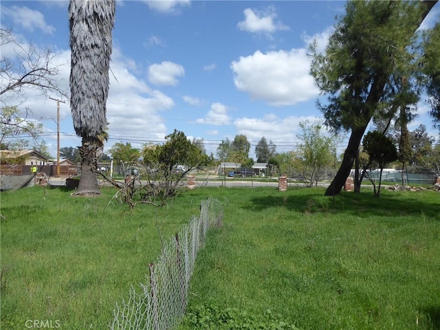 view of yard with fence
