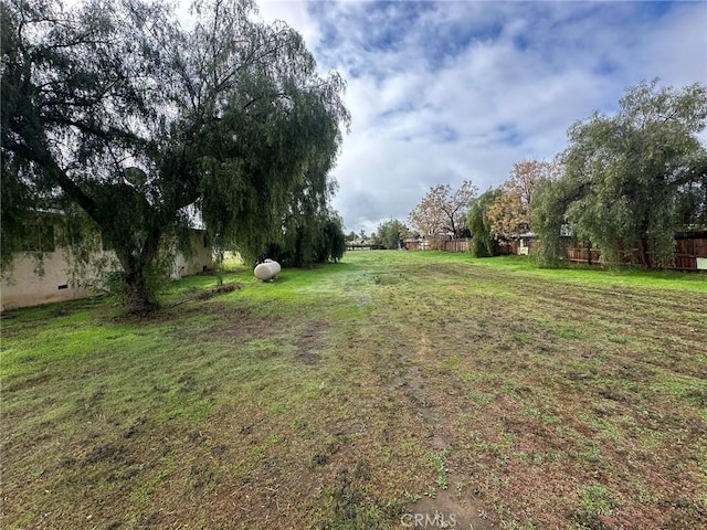 view of yard with fence