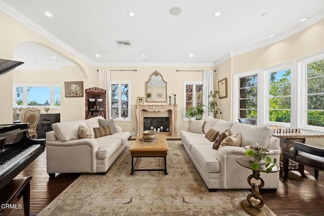 574 Camillo Rd, Sierra Madre, CA 91024 - living area with visible vents, arched walkways, a fireplace, wood finished floors, and recessed lighting