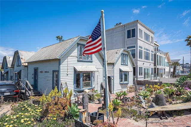 view of property exterior with a residential view