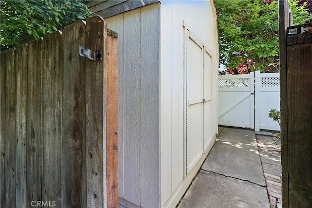 exterior space with fence and a gate
