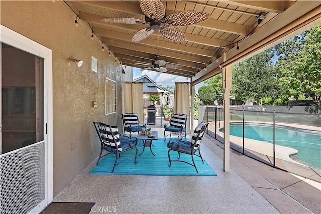 3571 White Wolf Ct, Merced, CA 95340 - fenced backyard featuring a ceiling fan and a patio