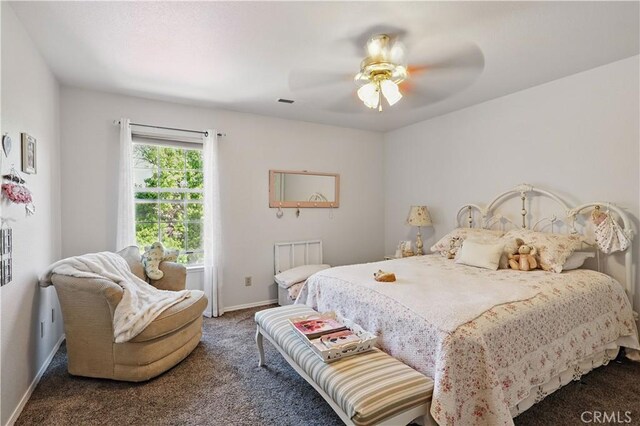 3571 White Wolf Ct, Merced, CA 95340 - carpeted bedroom featuring baseboards and a ceiling fan