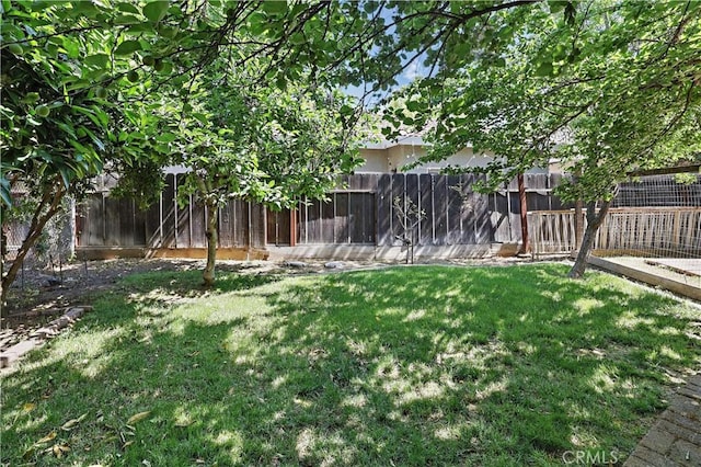 view of yard with fence