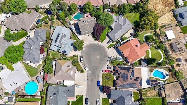 3571 White Wolf Ct, Merced, CA 95340 - aerial view of property and surrounding area with a pool and nearby suburban area